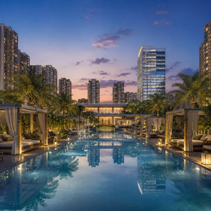 Artistic impression: Pool deck with cabanas surrounded by towers at dusk